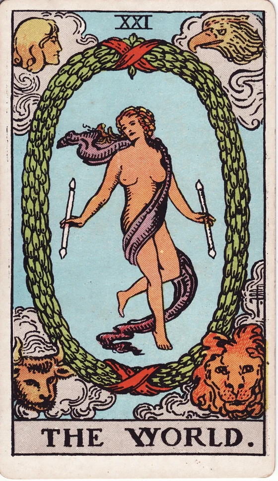The World tarot card from the Rider–Waite–Smith deck: a dancing figure wrapped in a sash inside a large laurel wreath, holding two wands, with an angel, eagle, lion and bull in the corners.